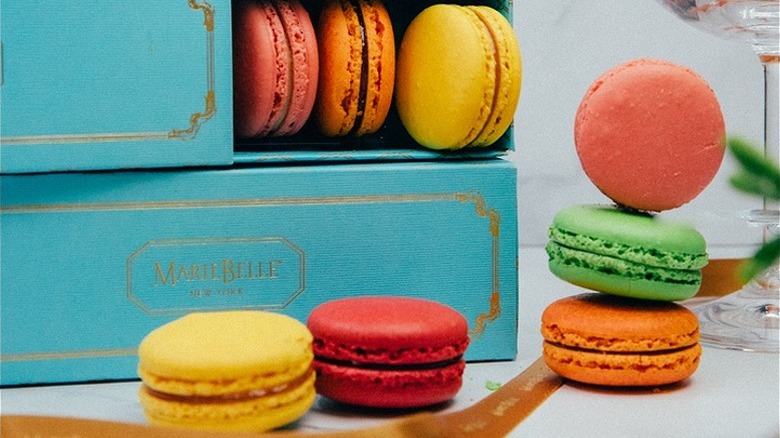 colorful macarons with blue box