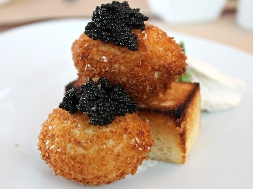 Crispy Poached Eggs with Caviar and Crème Fraîche at Perry St