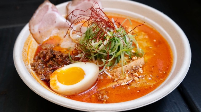 Ramen with pork, greens, and an egg
