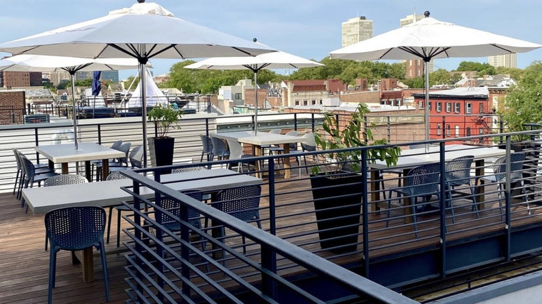 Rooftop patio with tables
