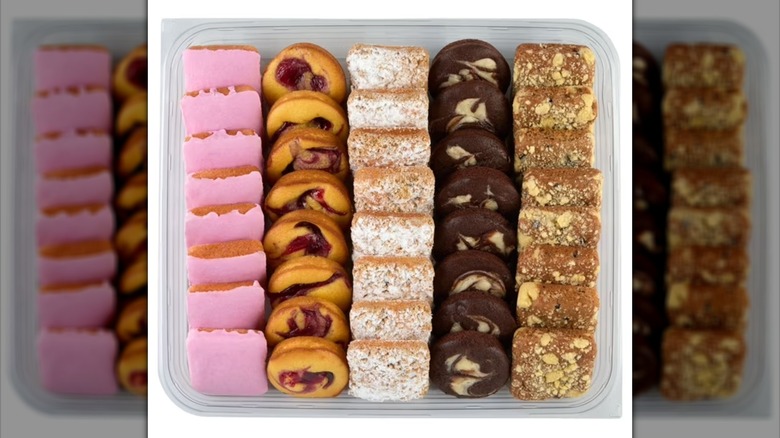 Various sweet pastries in plastic container