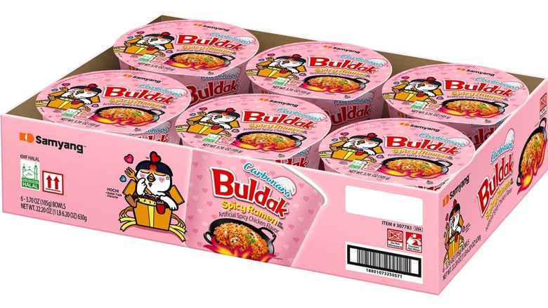 Samyang Buldak Carbonara Spicy Chicken Ramen Bowl at Sam's Club against a white background.