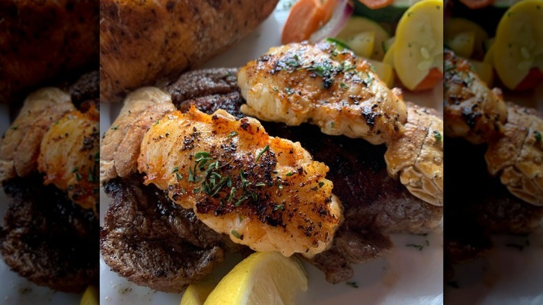 Lobster tails on a steak