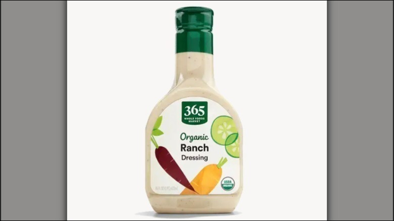 A bottle of Whole Foods 365 Organic Ranch on a white background