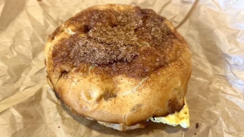 Cinnamon Crunch Bagel on paper wrapping
