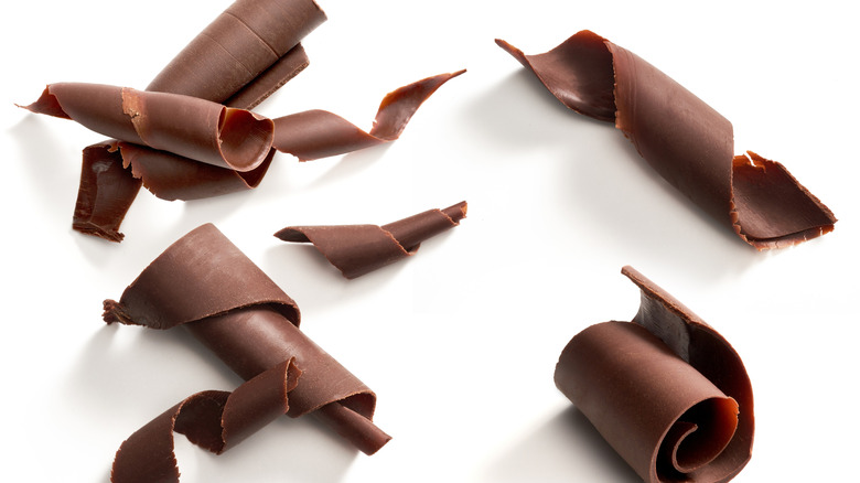 Chocolate curls on a white table