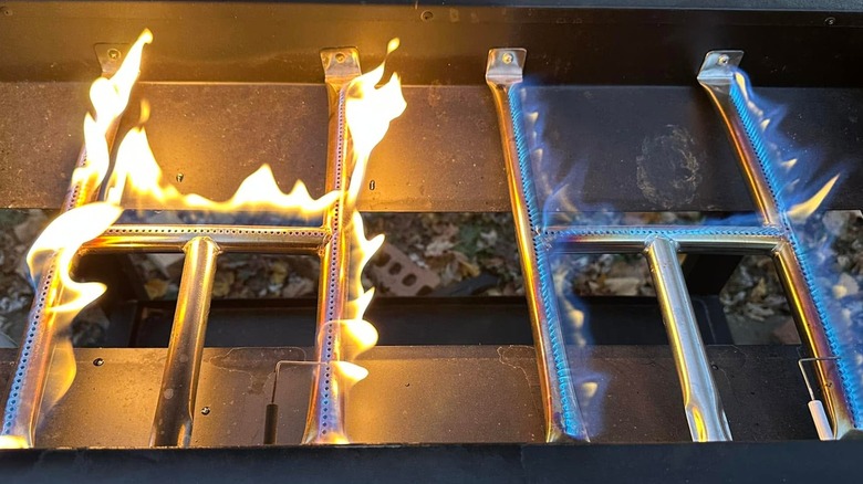 Yellow (left) and blue (right) flames in a Blackstone griddle