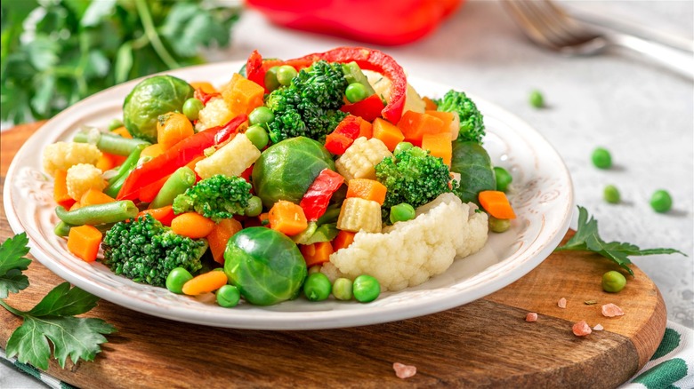 Colorful blanched vegetables on plate