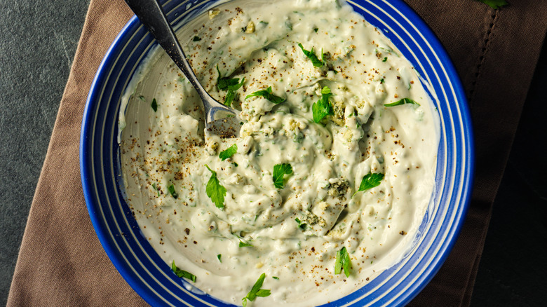 Blue cheese mayonnaise in a blue bowl