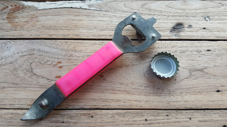 Church key with pink handle