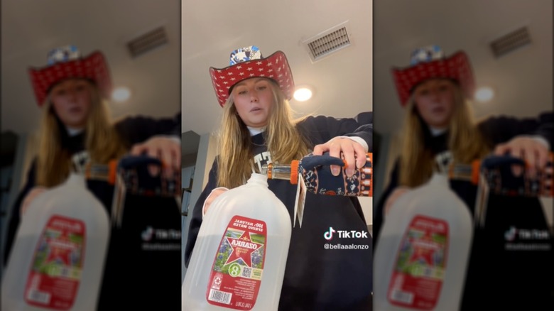 Pouring vodka into gallon bottle