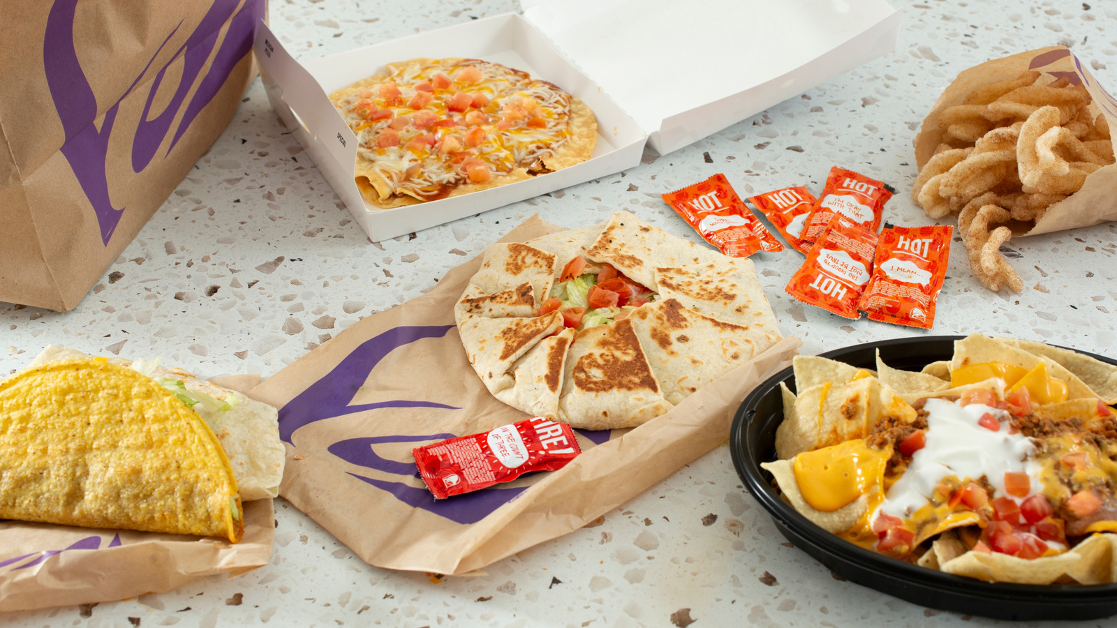 FoodWireDaily — The Big Brand Behind Taco Bell's Famous Hot Sauces