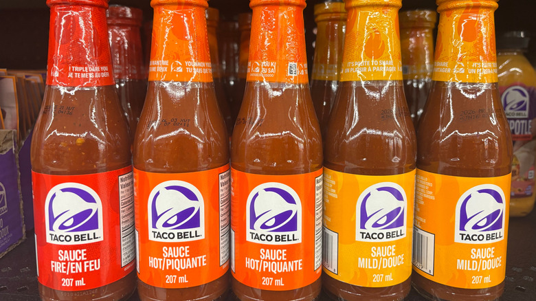 Bottles of Taco Bell hot sauce