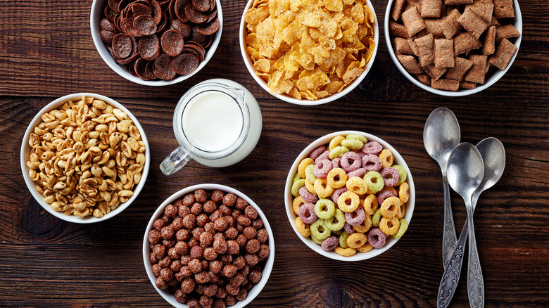variety of cereals in different bowls