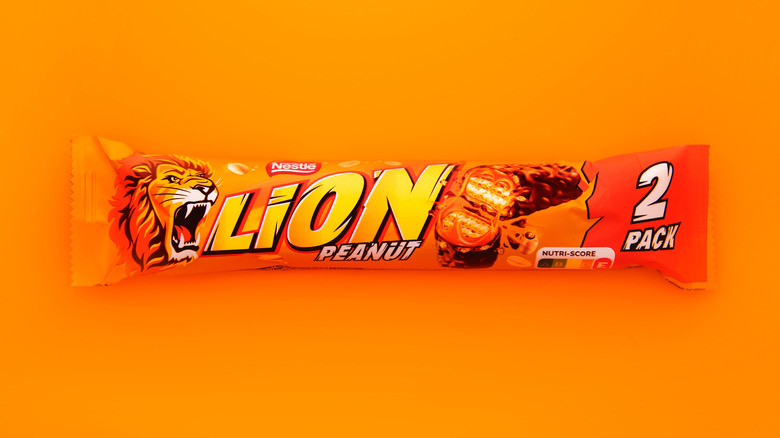lion peanut candy bar on orange