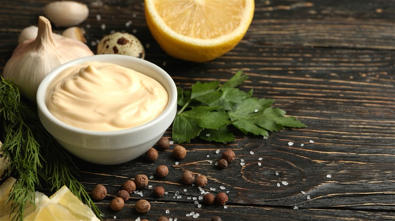 Bowl of mayonnaise and herbs