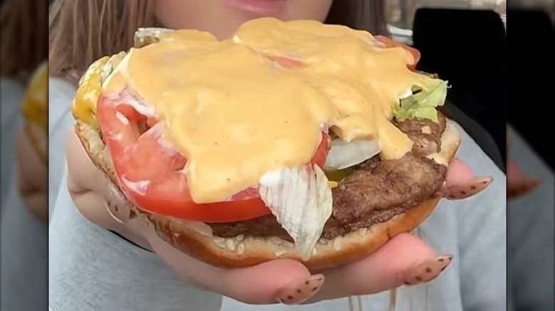 An open Whopper with zesty sauce, extra cheese, and jalapenos