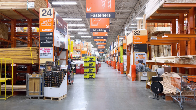 two people walking to a home depot