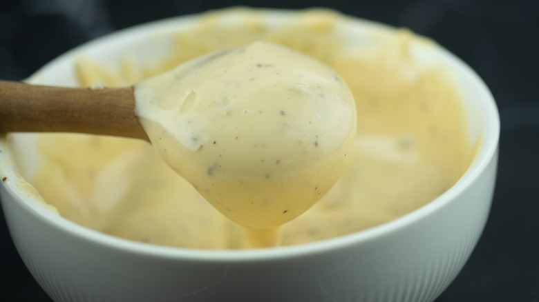 creamy caesar dressing bowl, spoon