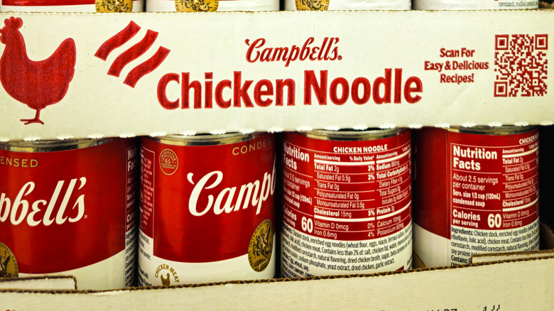 cans of campbell's chicken noodle soup in a box