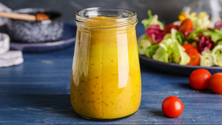 Mustard jar on a summery table