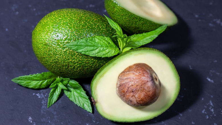 An avocado cut open