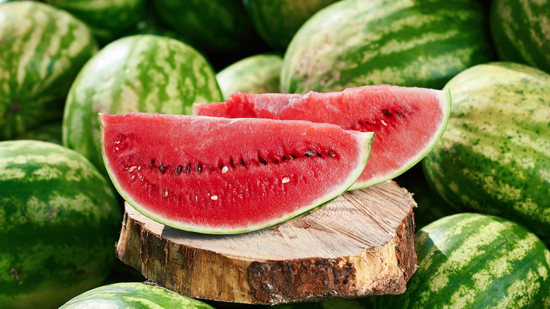 Watermelon cut open on wood
