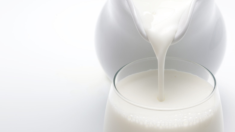 pouring milk in glass