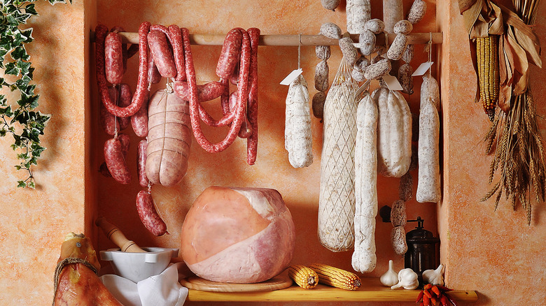 cured meats hanging in pantry