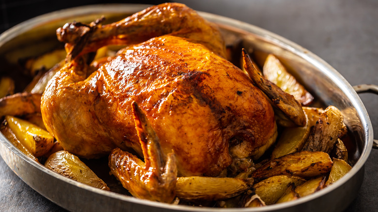 whole roast chicken with potatoes