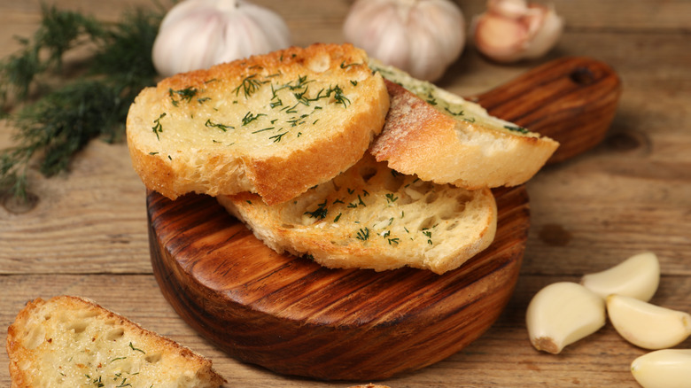 Garlic bread on a cutting board