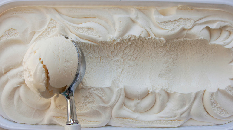 Scoop taken from vanilla ice cream