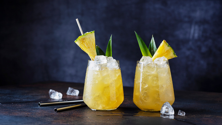 two glasses of pineapple cocktail