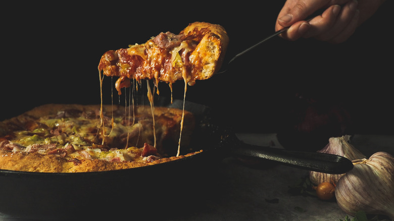 Deep dish pizza in cast iron skillet