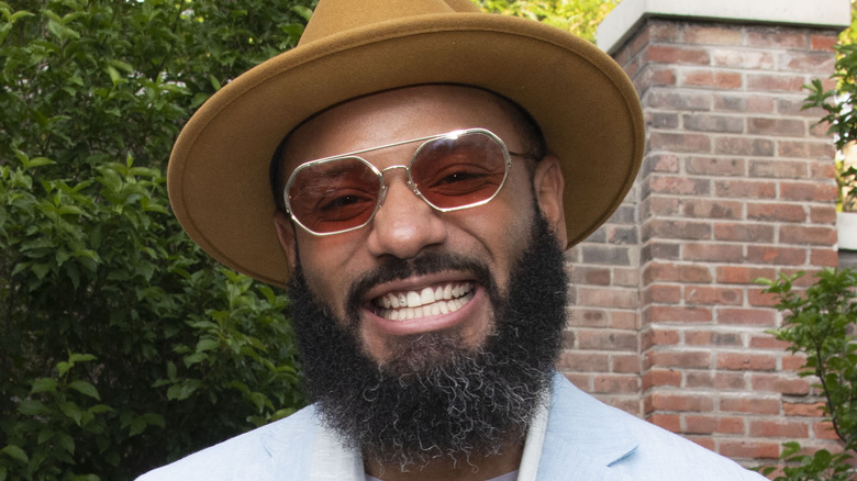 Justin Sutherland wearing hat