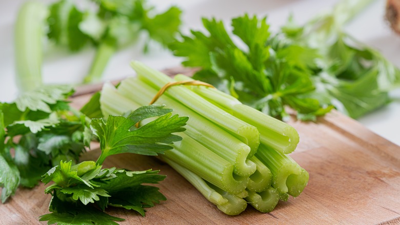 Celery on cutting board