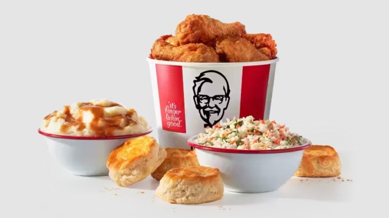 A KFC family meal featuring a large container of coleslaw