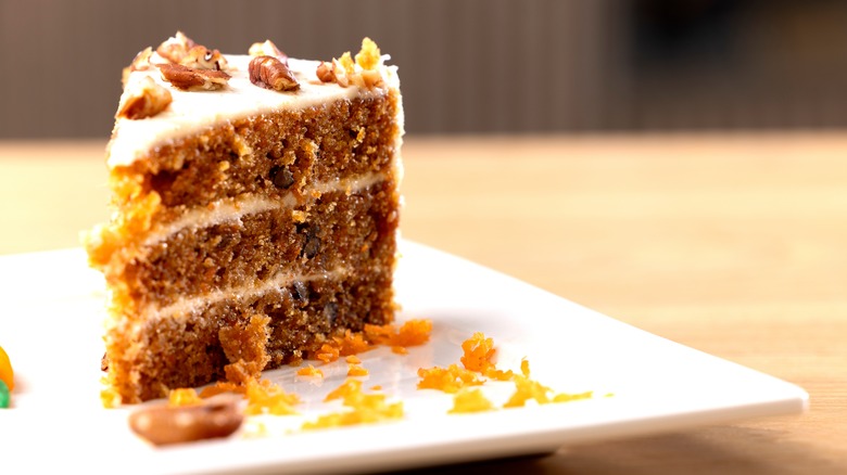 Carrot cake on a square white plate