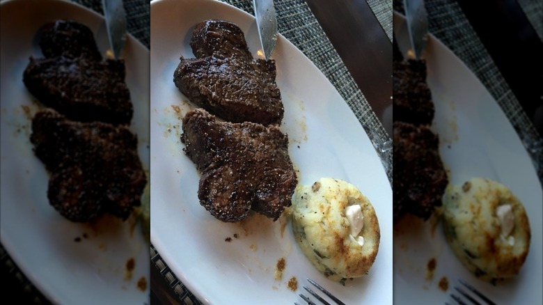 A filet mignon steak served with mashed potatoes at Del Frisco's Double Eagle Steakhouse