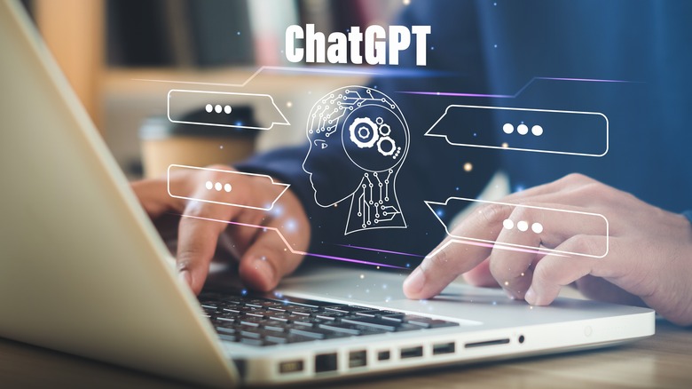 Computer and graphic that reads chat GPT with a robot head 