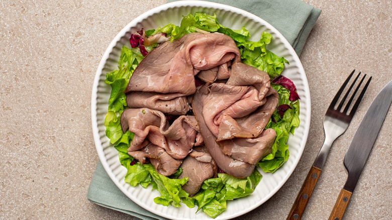 Deli sliced roast beef on a plate