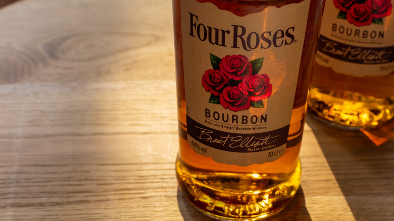 Close-up of Four Roses bourbon on table