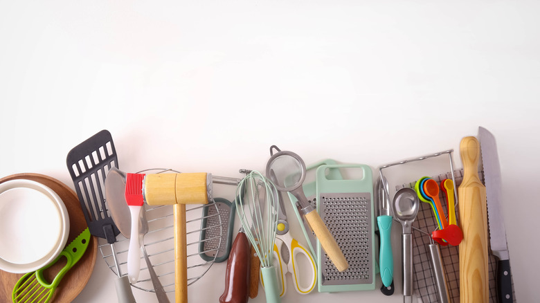 Various kitchen tools arranged on a countertop