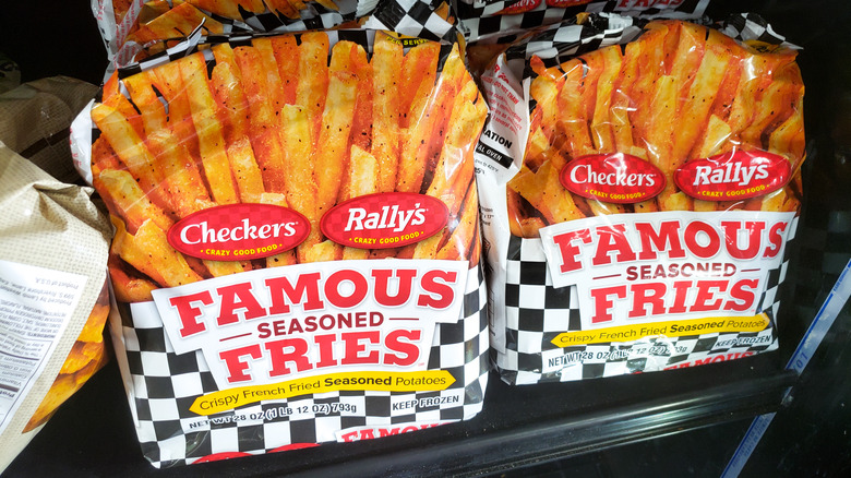 Bags of frozen Checker's fries in a store