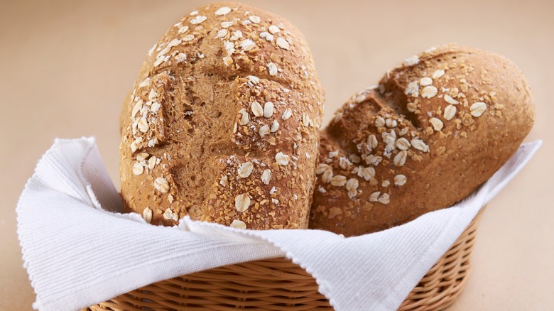 Bread basket, with two loaves of bread inside