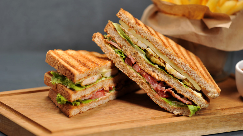 club sandwich on cutting board