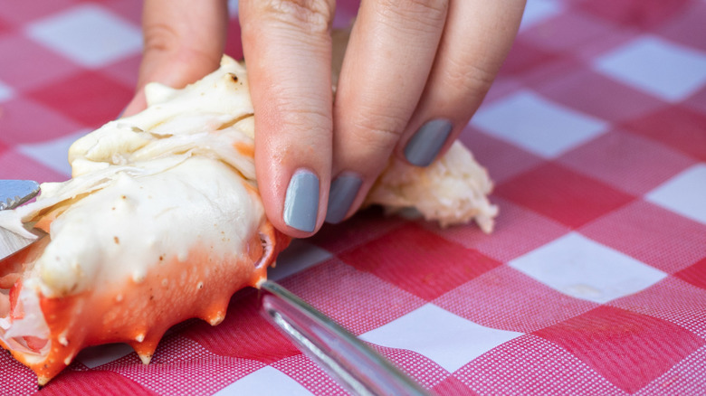 Cutting crab leg with shears