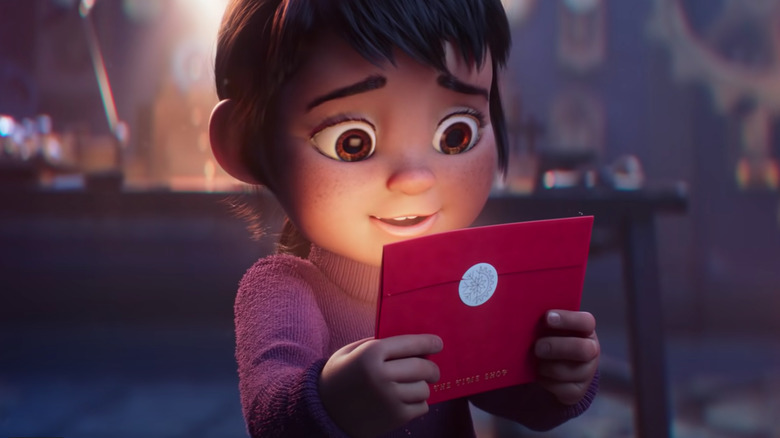 Sam from Chick-fil-A holiday film holding a letter