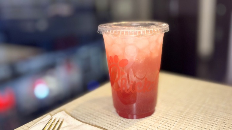 A closeup on a Strawberry Hibiscus Sunjoy from chick-fil-a on a table