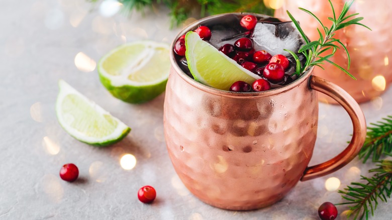 Holiday cranberry cocktail in Moscow mule glass